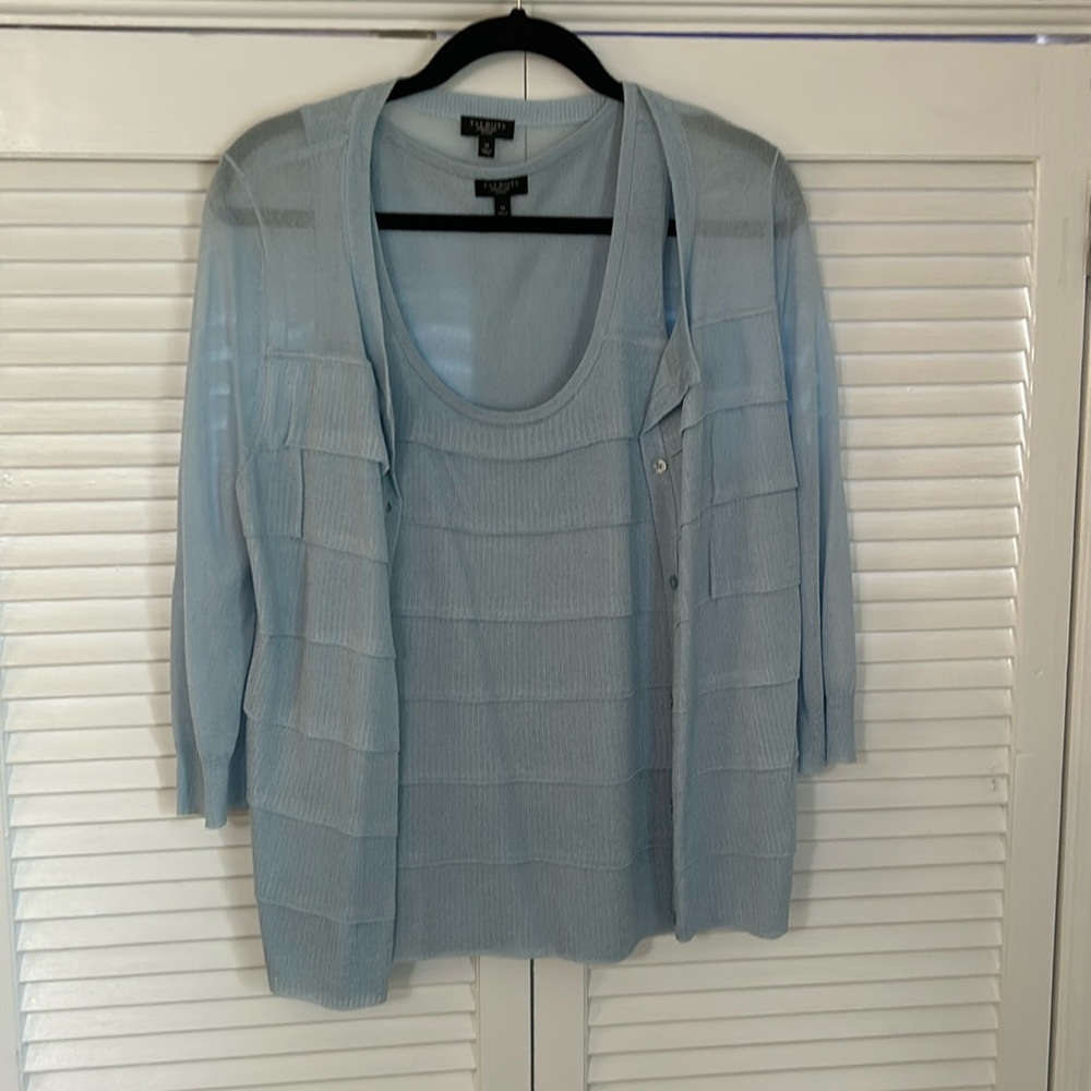 Talbots sweater set. She’ll is sleeveless and outer sweater has 3/4 sleeves.